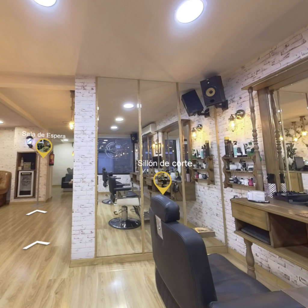 Interior de la barbería Mario Style en Las Rozas con vista a la sala de espera y sillones de corte, parte de la visita virtual interactiva.